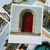 Collection of postcards with architectural scenes, including a red door.