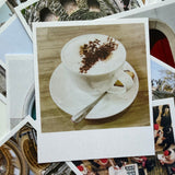 Close-up of a coffee cup with a saucer on a wooden surface, surrounded by other images.